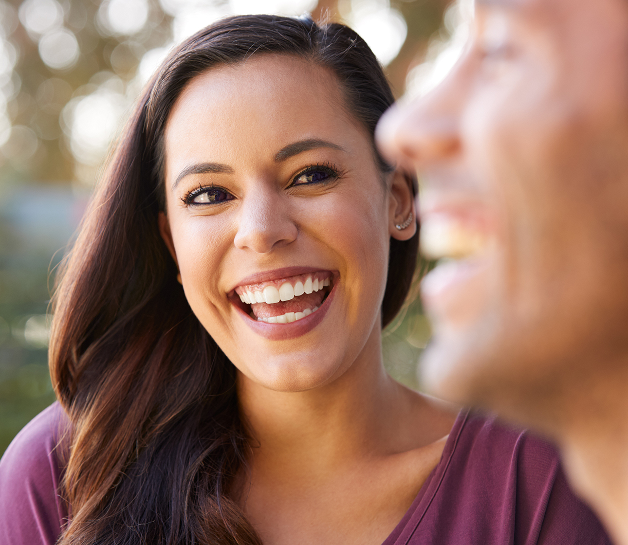 women-smiling-at-man