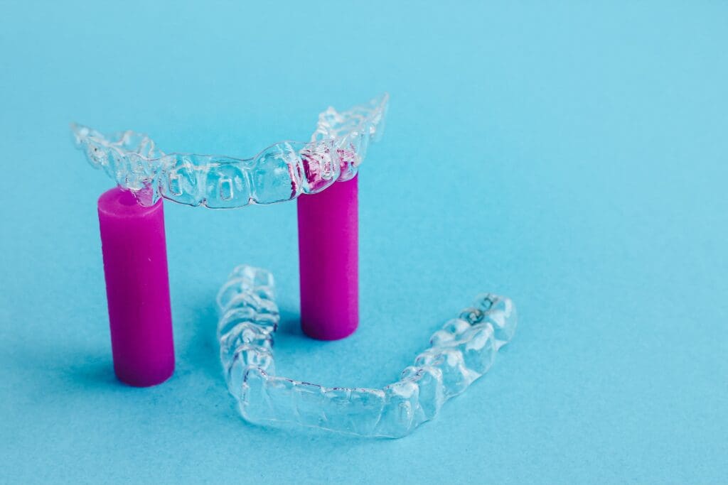 Clear and transparent invisible dental aligners to fix an overbite