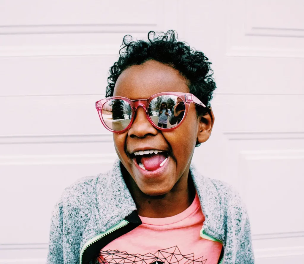 Smiling girl in sunglasses